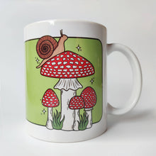 Laden Sie das Bild in den Galerie-Viewer, Snail with Fly Agaric Mushrooms | Mushroom Pals | Ceramic Mug - Scaredy Cat Studio
