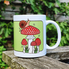 Laden Sie das Bild in den Galerie-Viewer, Snail with Fly Agaric Mushrooms | Mushroom Pals | Ceramic Mug - Scaredy Cat Studio
